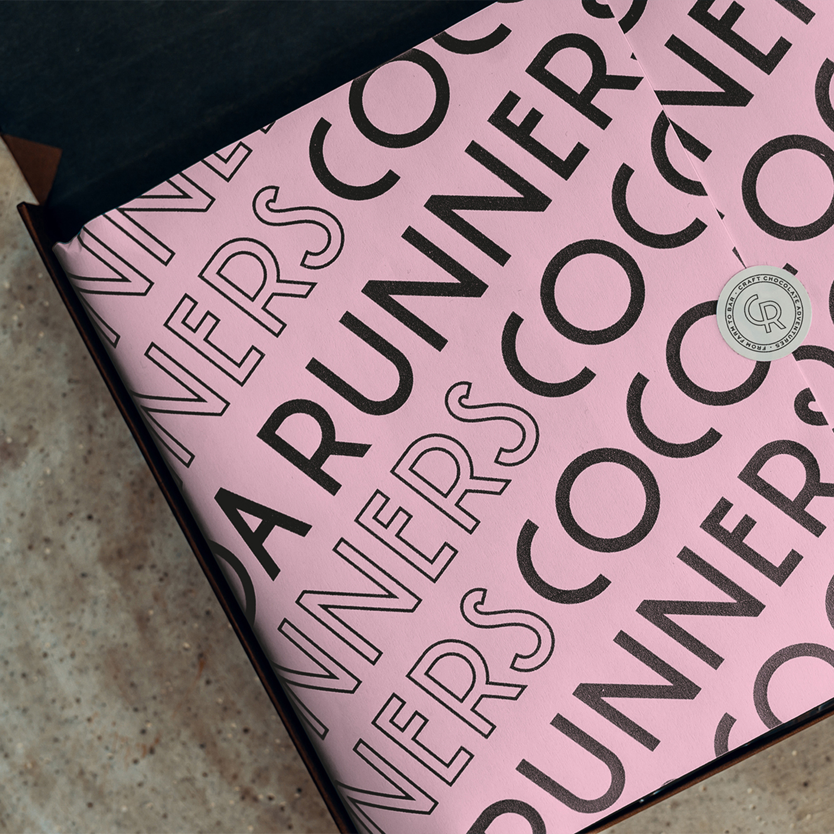 Bright blue fabric banner hanging from a pole, with a large light grey Harlaxton logo and shield on.