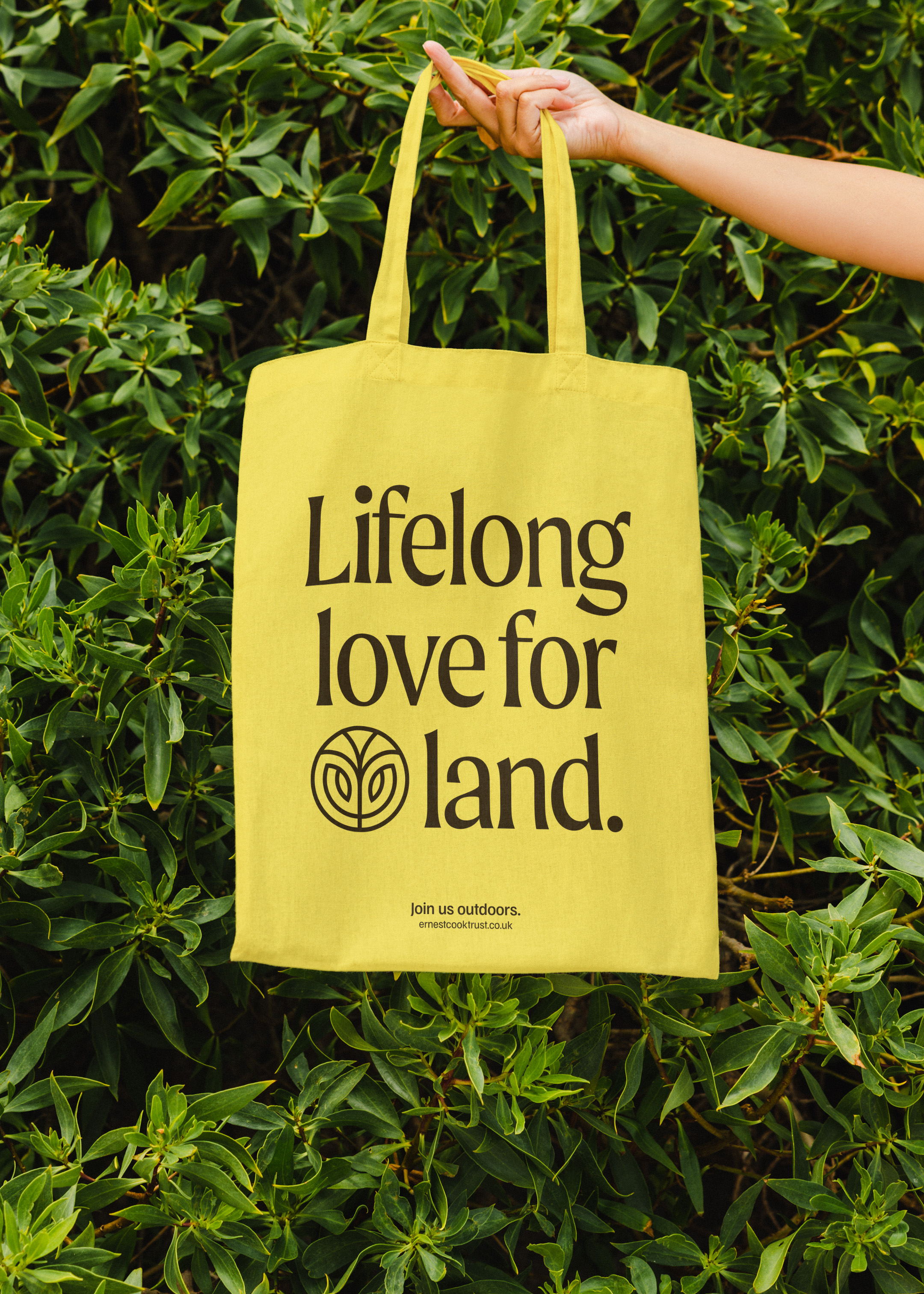 Tote bag with a brand message written largely on it