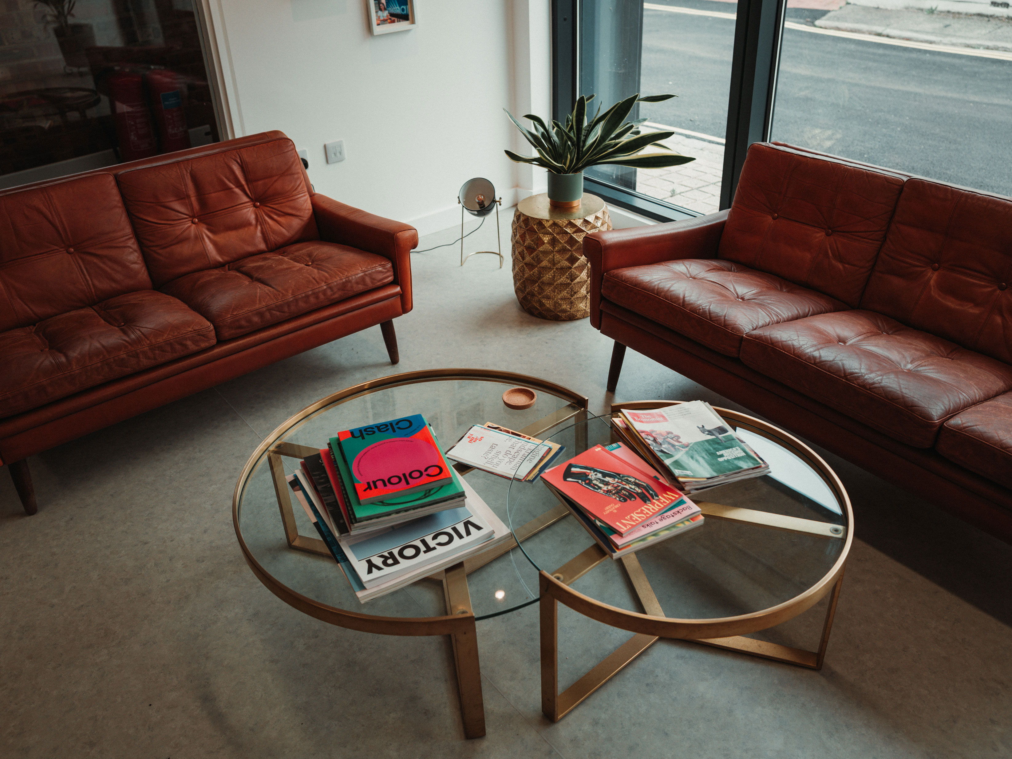 Two sofas and coffee table books for a relaxed entrance area