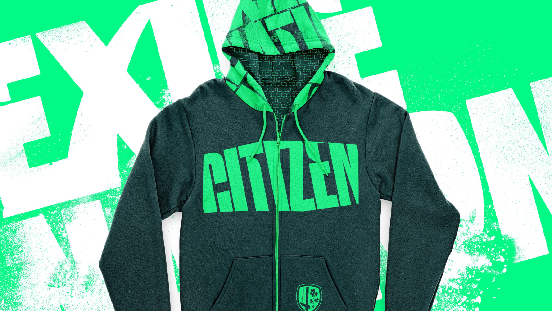 London Irish branded merchandise: a dark green hoodie with neon green ‘citizen’ on the chest and a text-patterned hood