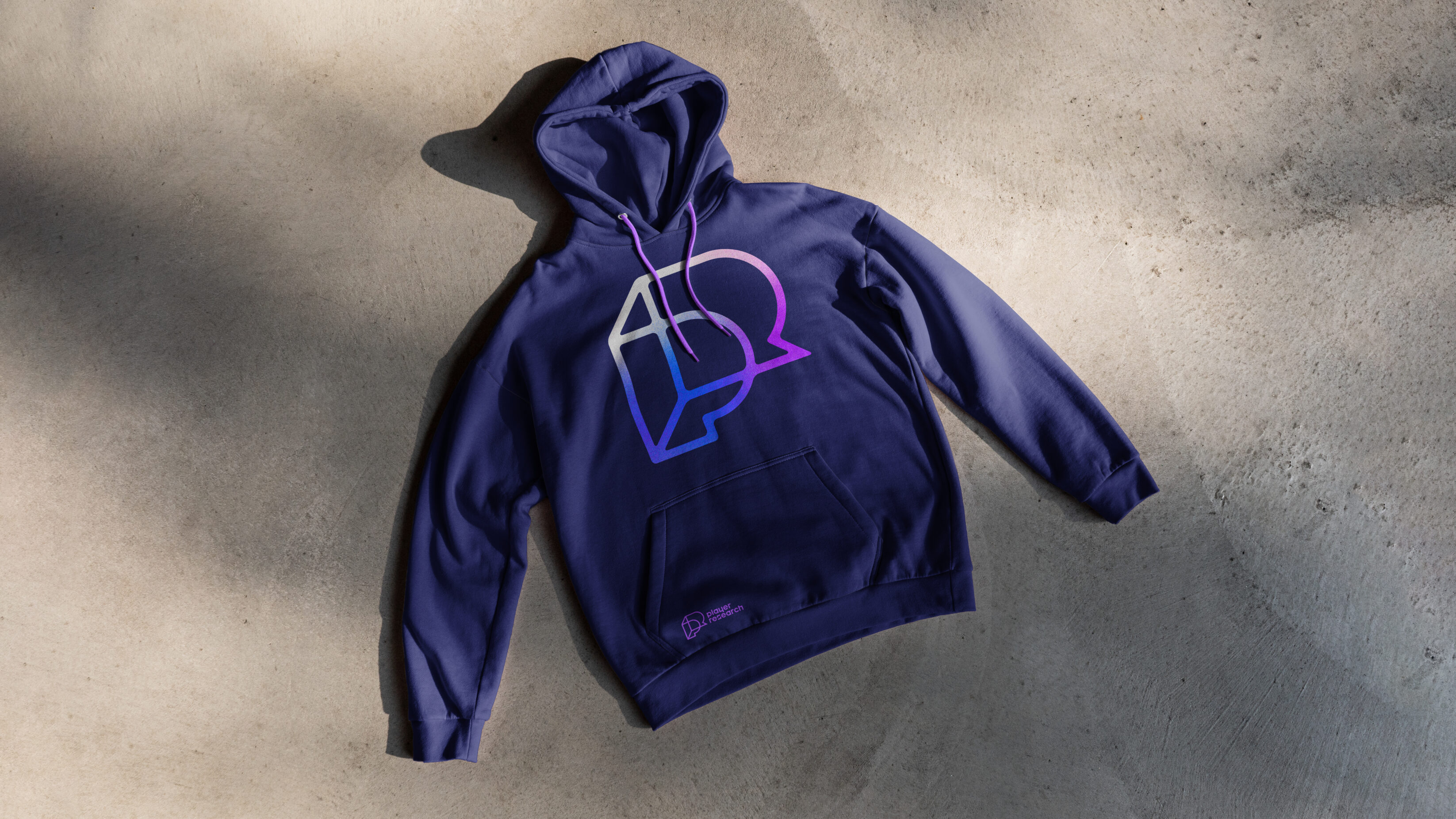 player research hoody on concrete surface