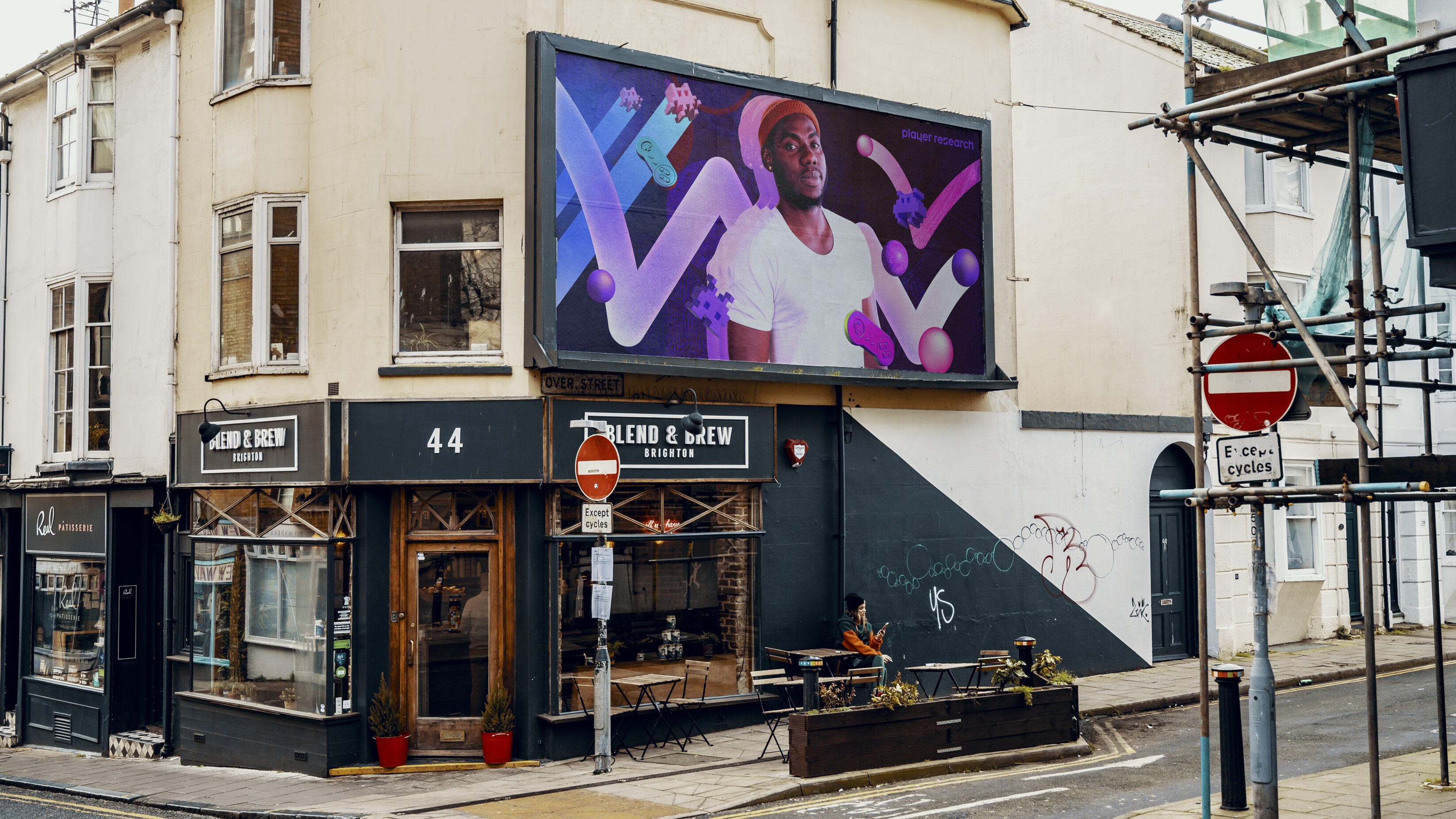 Player research billboard on street corner