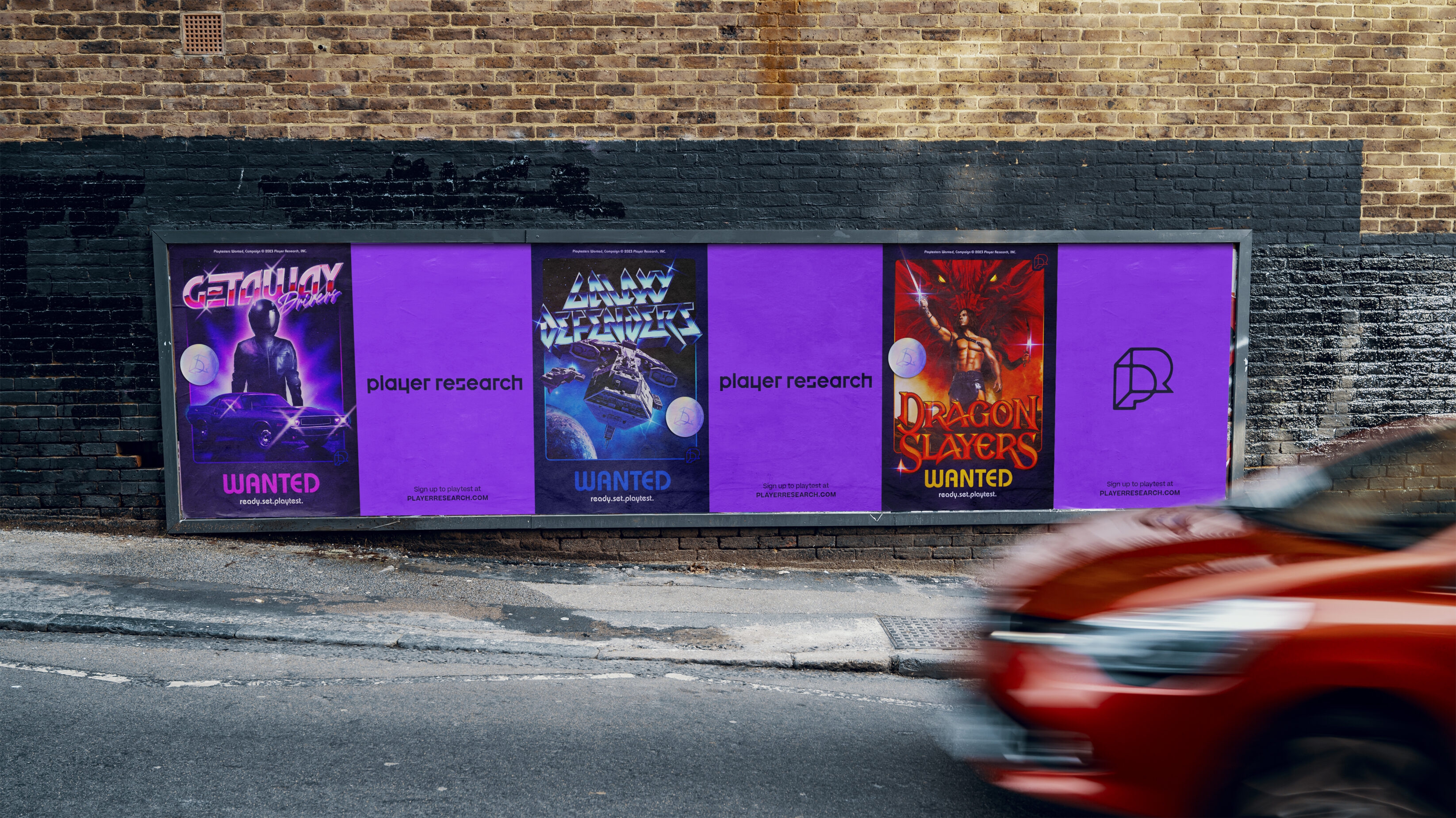 Playtesters Wanted campaign posters on a Brighton street side billboard