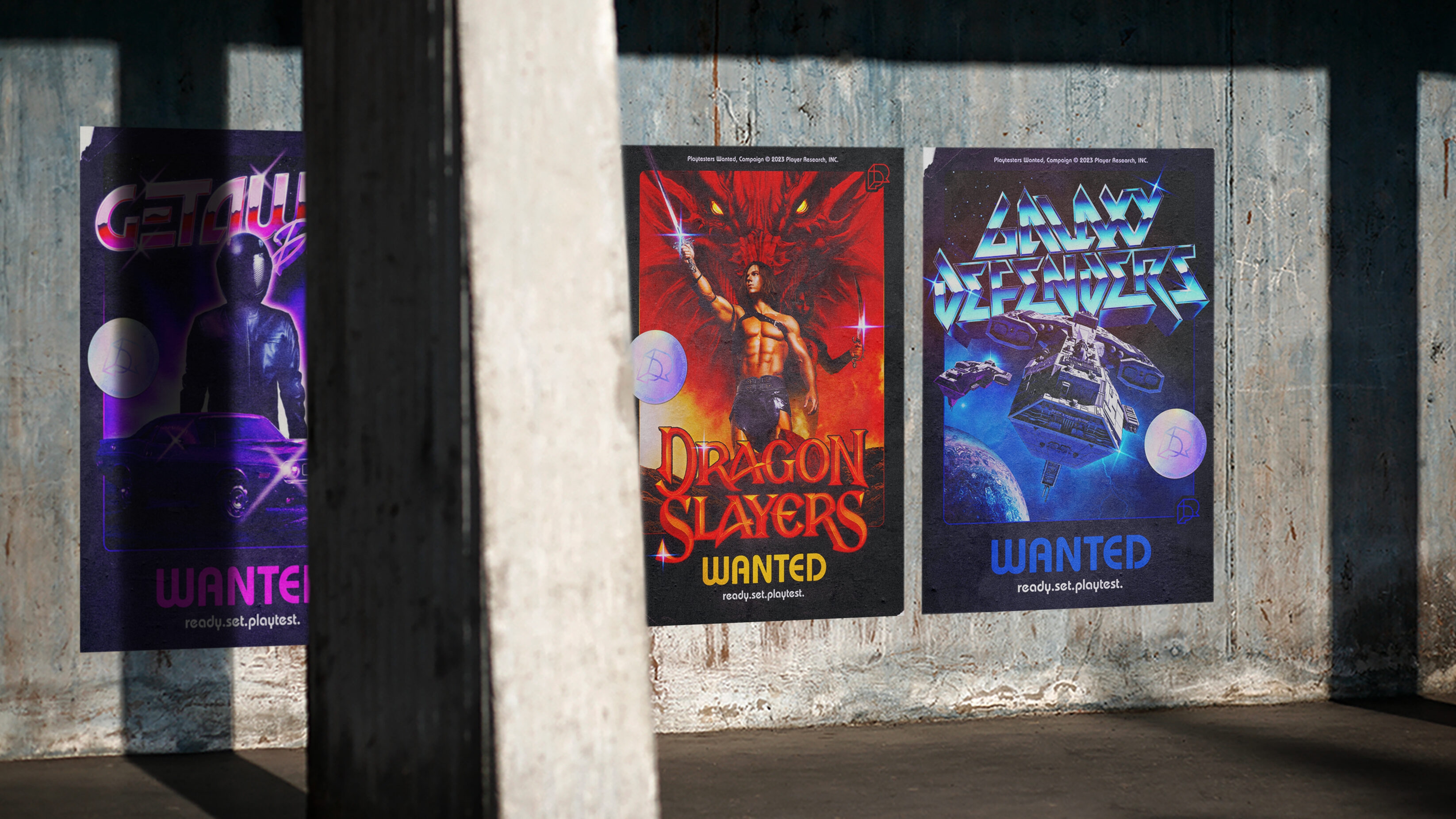 Three Playtesters Wanted campaign posters on a concrete wall