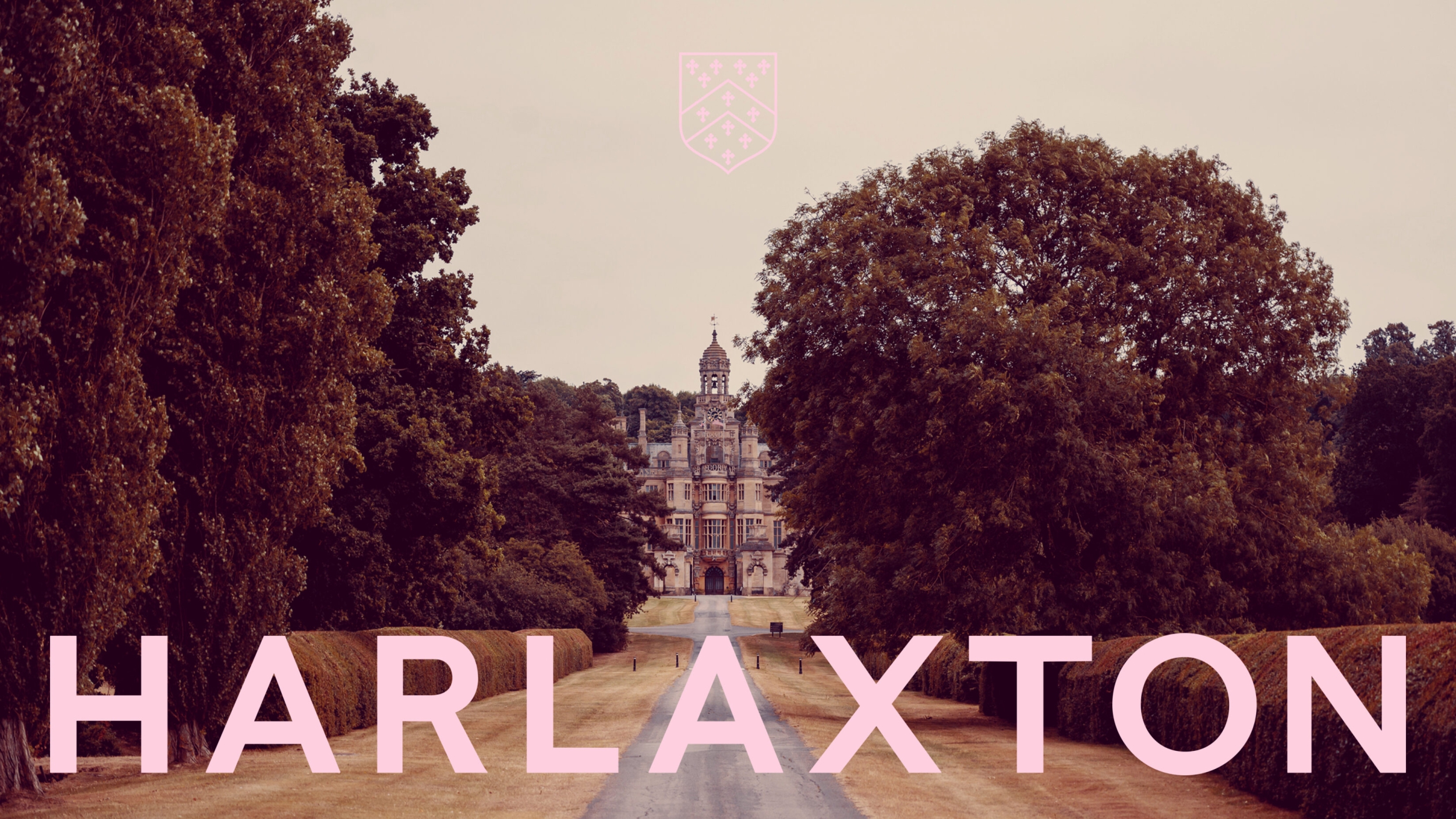 Harlaxton College driveway, which goes between rows of trees that leads to the main building.