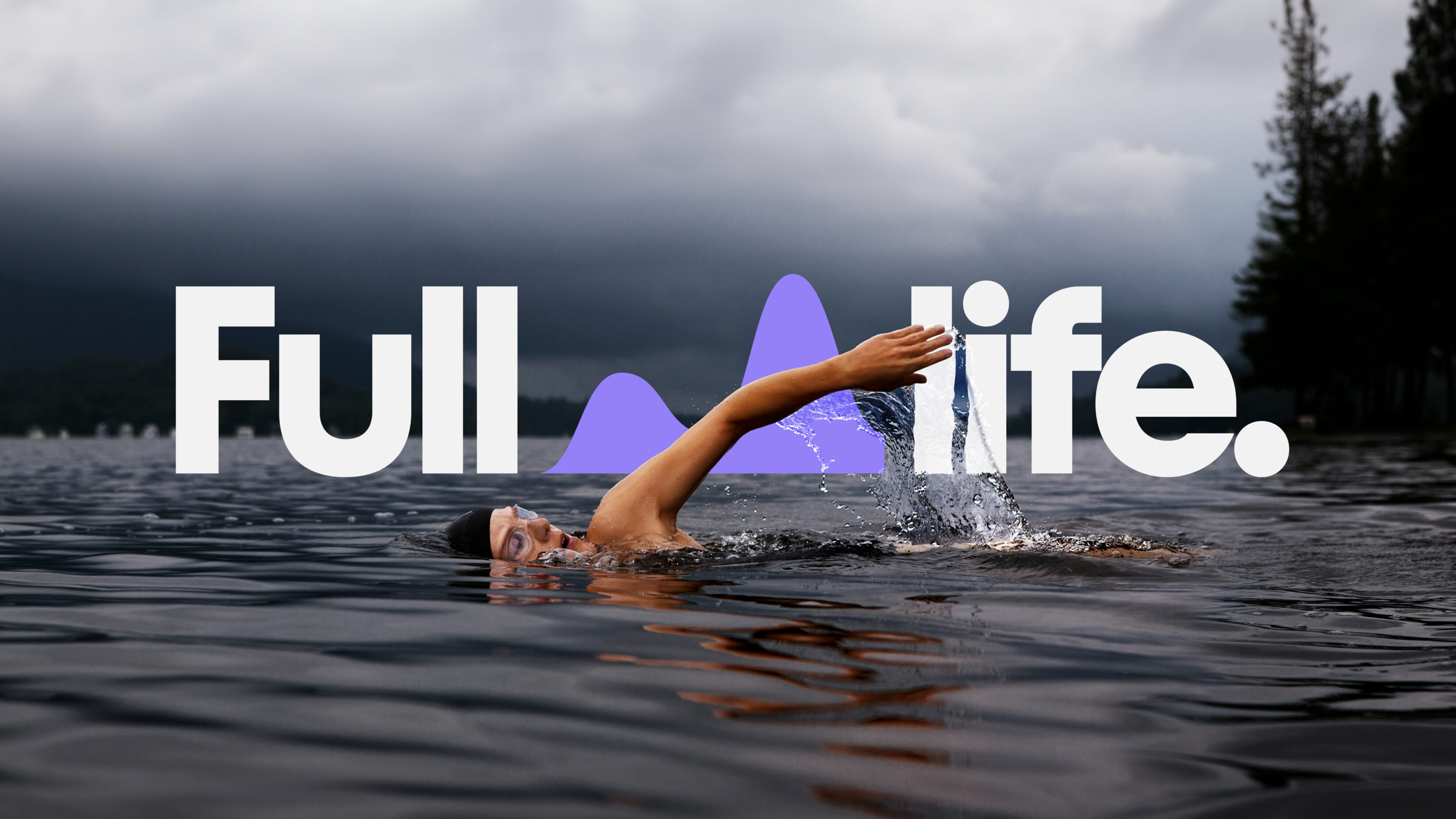Woman swimming with the full Spectrum Life logo lockup