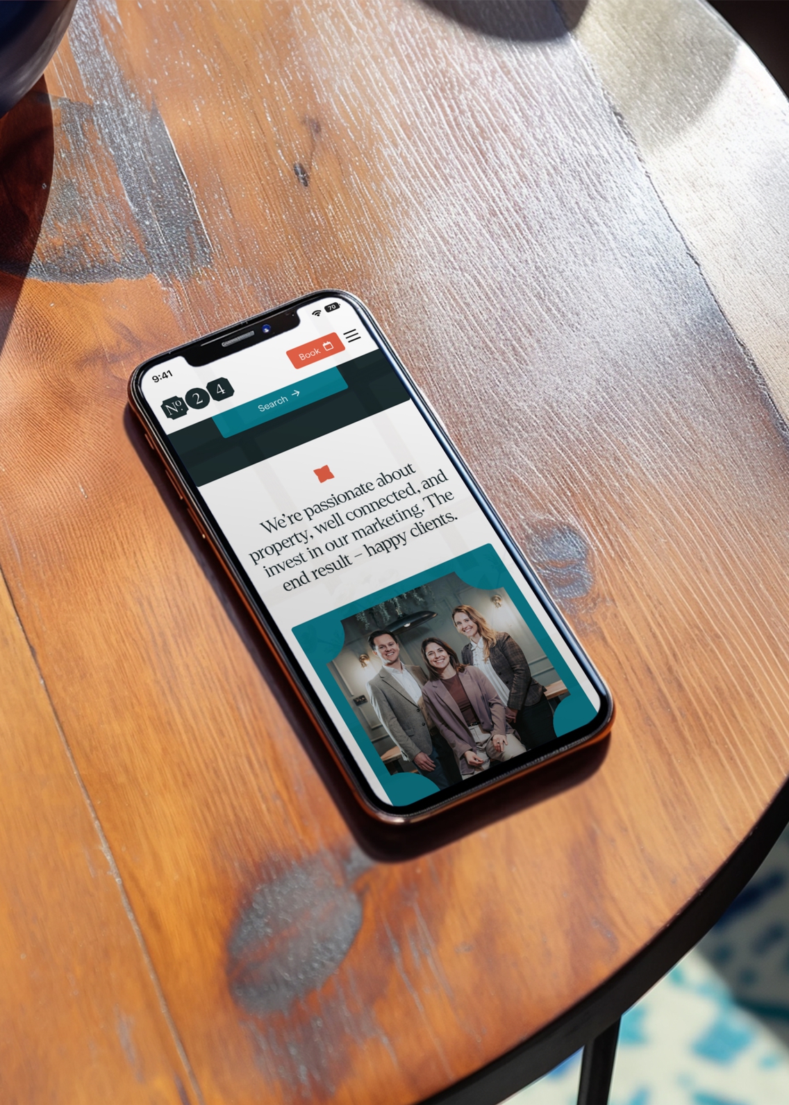 The 'about us' page of the website, promoting the team and their ethos, shown on a mobile device