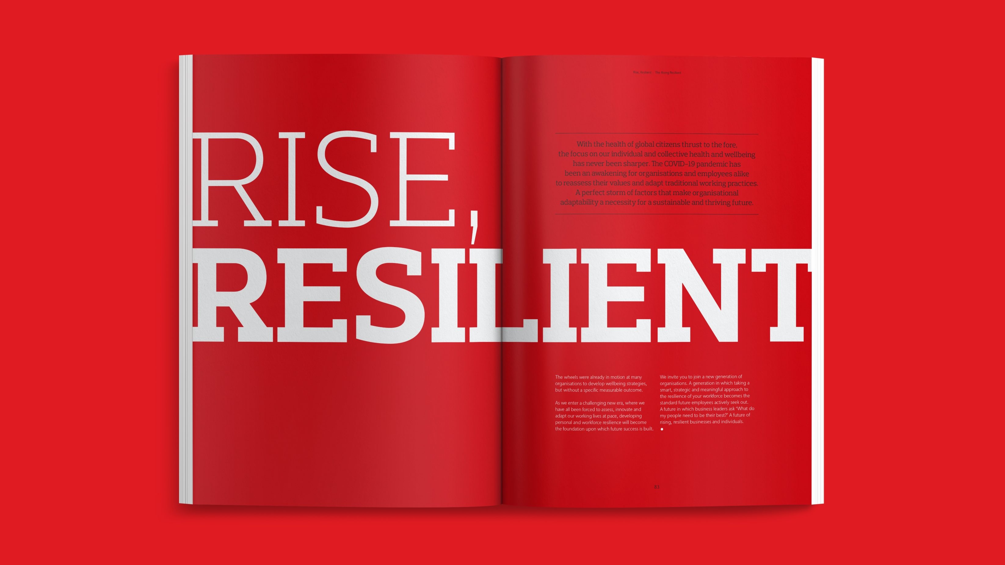 An open double-spread book with the words 'RISE, RESILIENT' in font large enough to fill the pages cover to cover