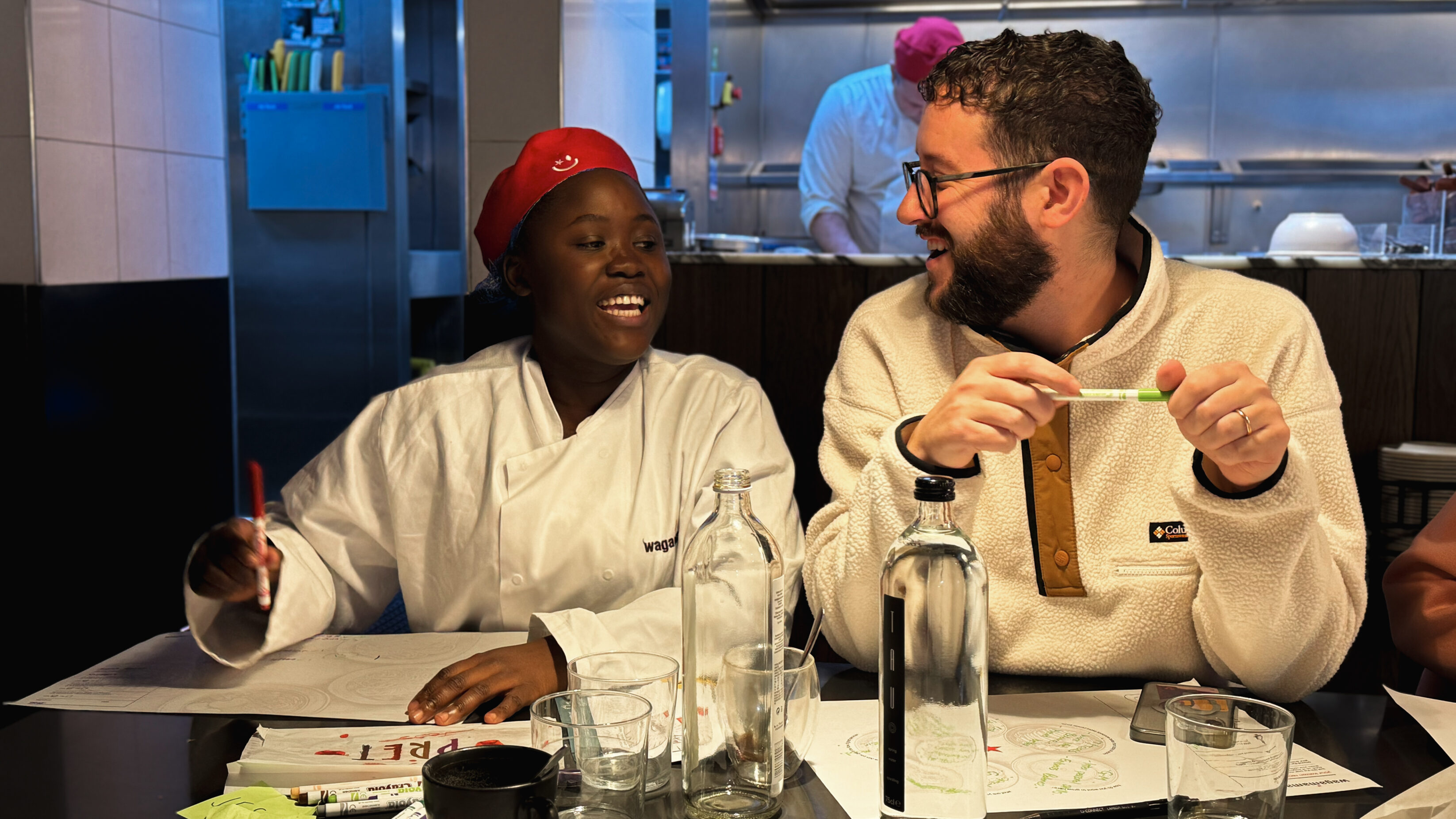 A team of employees at wagamama looking excited and happy about their employer brand