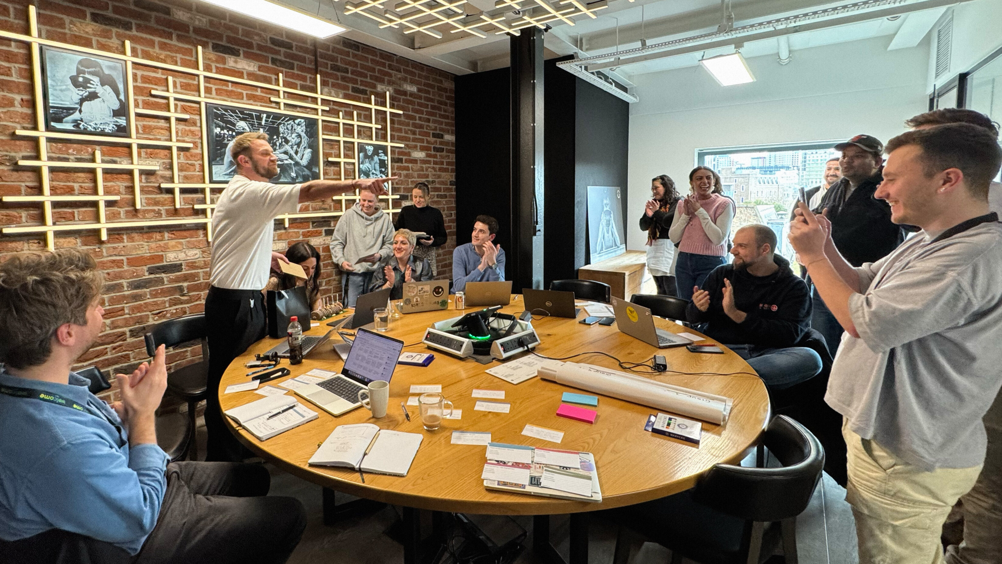A team of wagamama employees in a workshop, lots of fun and happy people exploring their employer brand