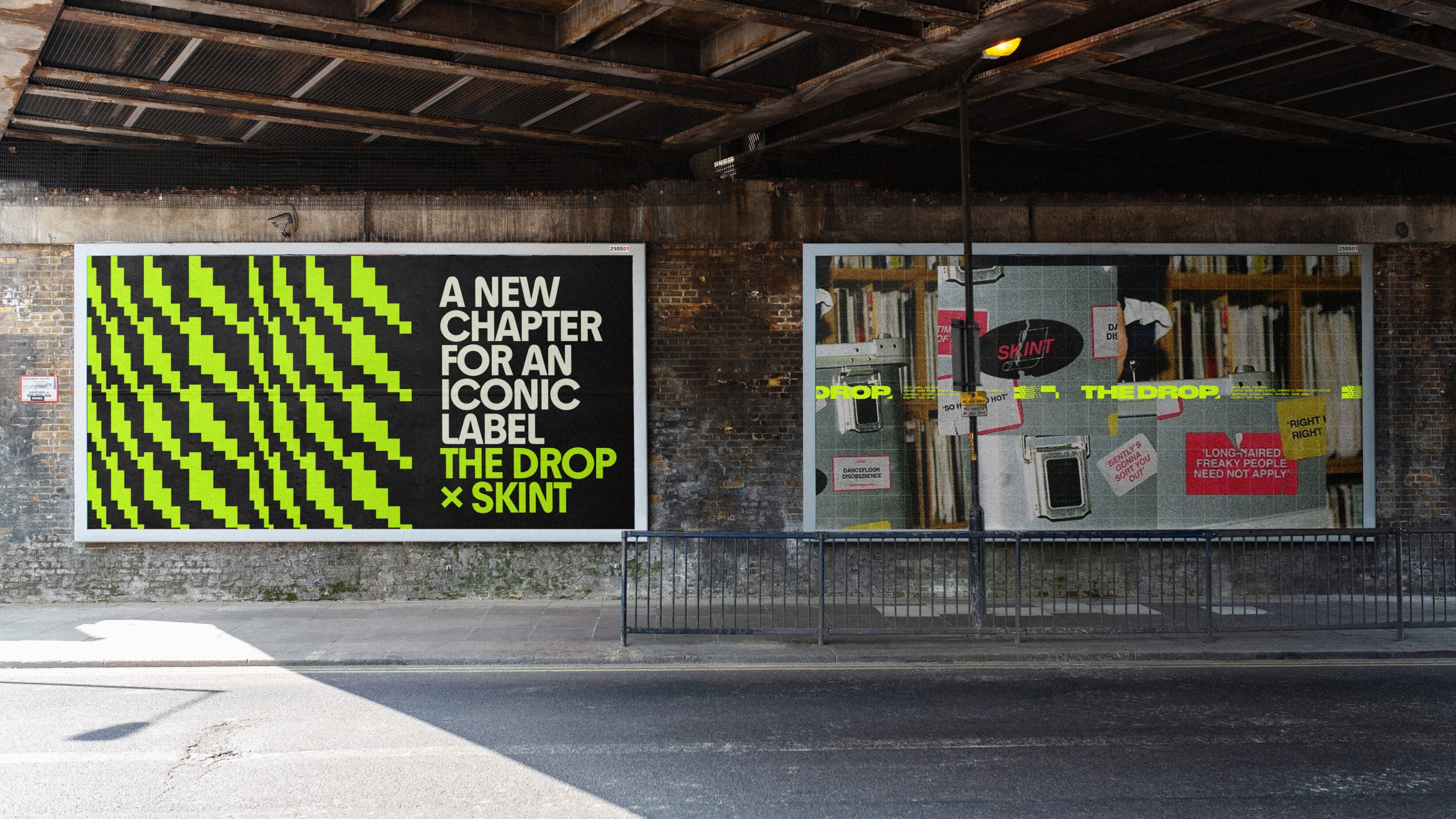 Two billboards under a bridge