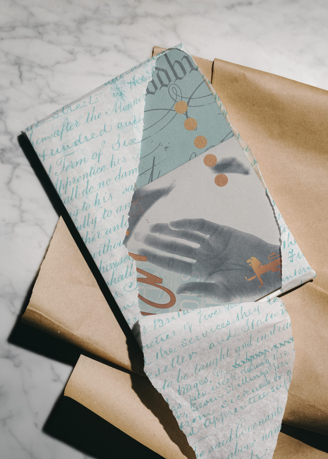Patterned paper revealing the coffee table book.
